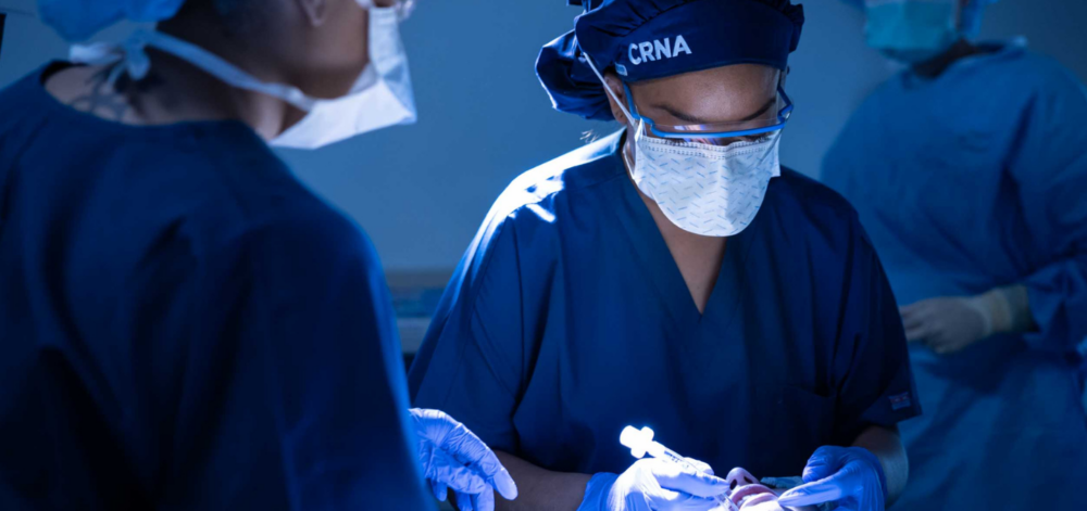 CRNA with patient intubated