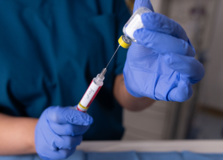 CRNA prepping medications for anesthesia