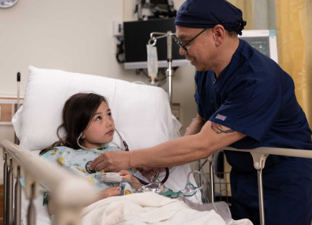 CRNA with a child patient