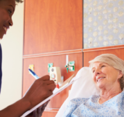 CRNA going through checklist with patient