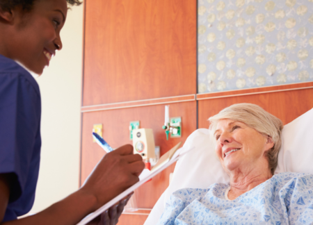 CRNA going through checklist with patient