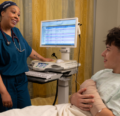 CRNA reviewing a checklist with a child