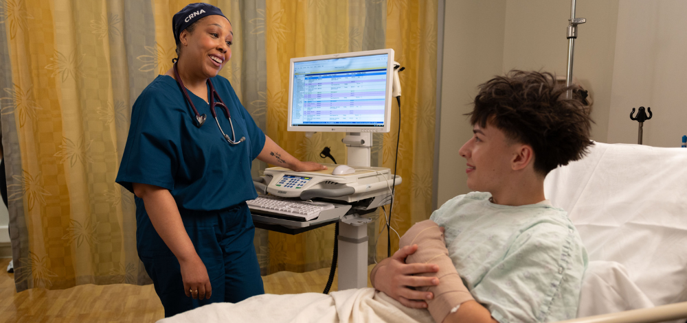 CRNA reviewing a checklist with a child