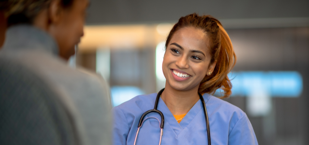 Nurse explaining procedure to patient