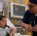 Child patient eating a popsicle